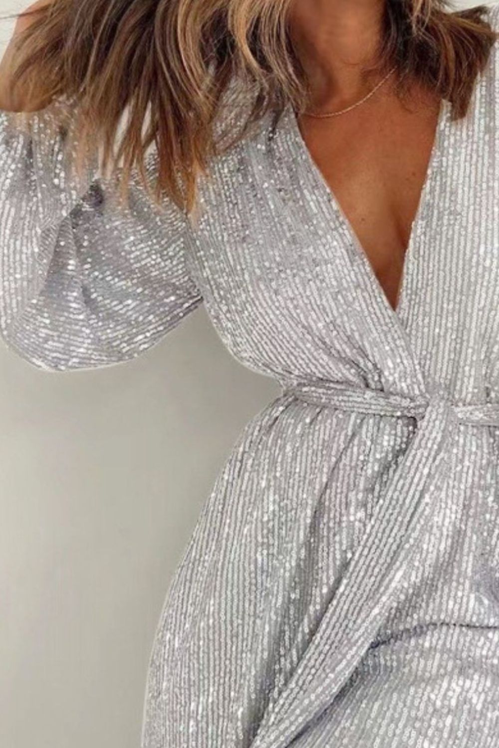 Full Size Sequin Surplice Tie Waist Long Sleeve Romper Trendsi