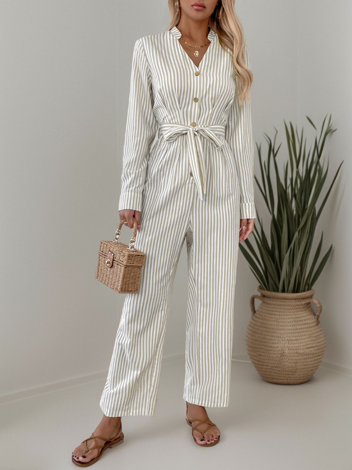 Striped Notched Long Sleeve Tie Waist Jumpsuit Trendsi