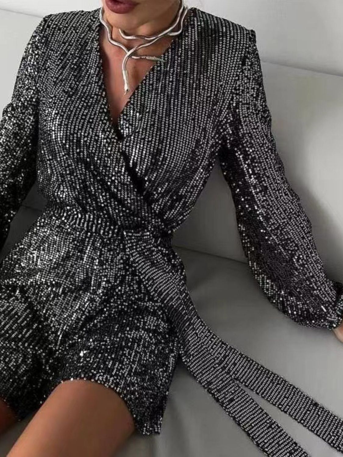 Full Size Sequin Surplice Tie Waist Long Sleeve Romper Trendsi