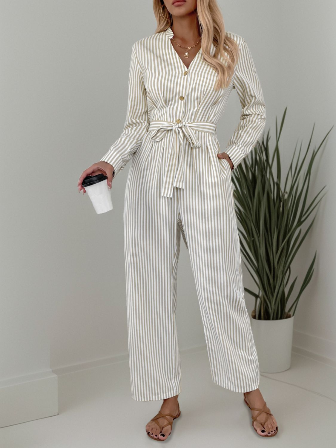 Striped Notched Long Sleeve Tie Waist Jumpsuit Trendsi