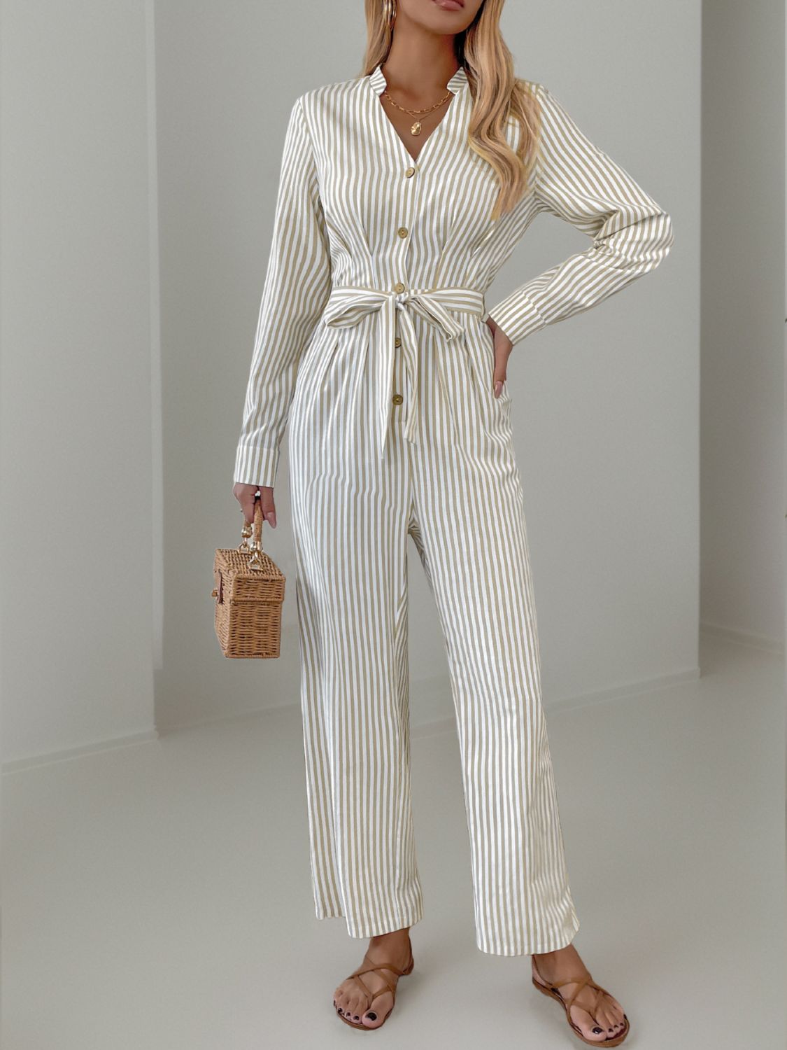 Striped Notched Long Sleeve Tie Waist Jumpsuit Trendsi