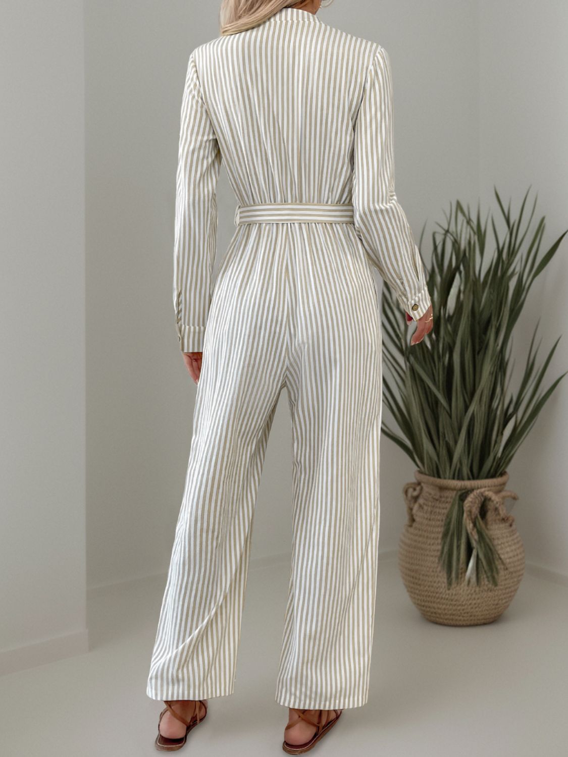 Striped Notched Long Sleeve Tie Waist Jumpsuit Trendsi