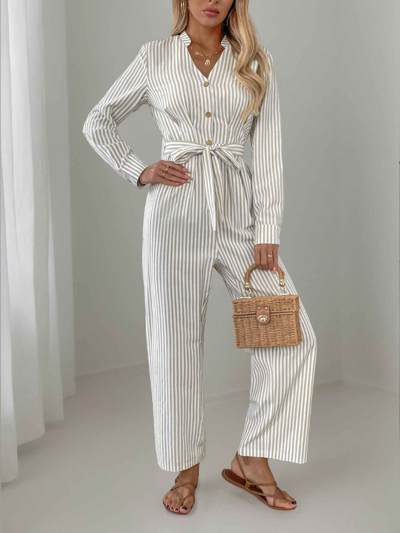 Striped Notched Long Sleeve Tie Waist Jumpsuit Trendsi