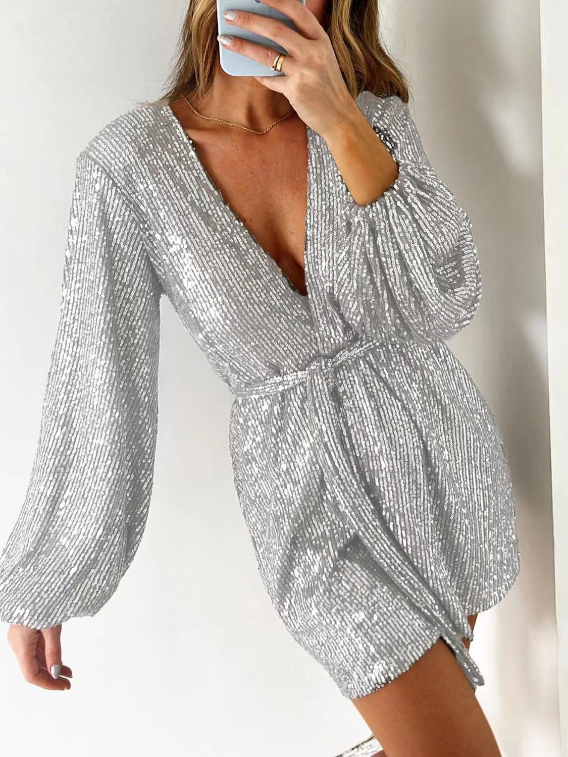 Full Size Sequin Surplice Tie Waist Long Sleeve Romper Trendsi