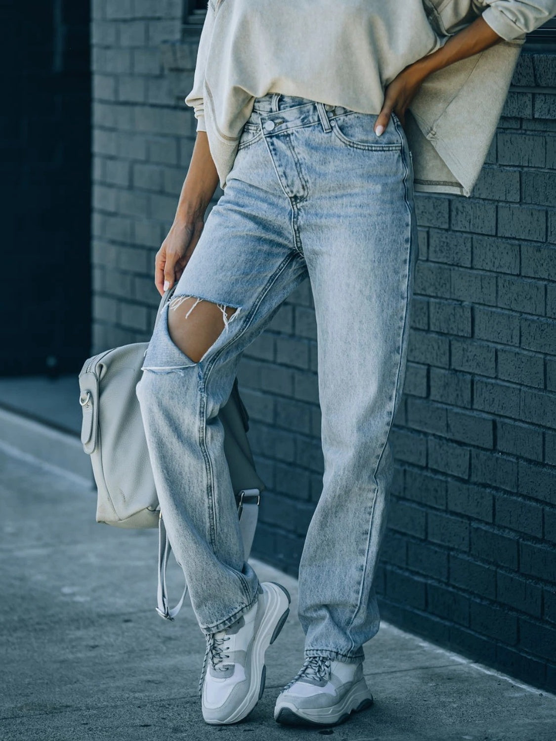 Distressed Asymmetric Waist Jeans Trendsi