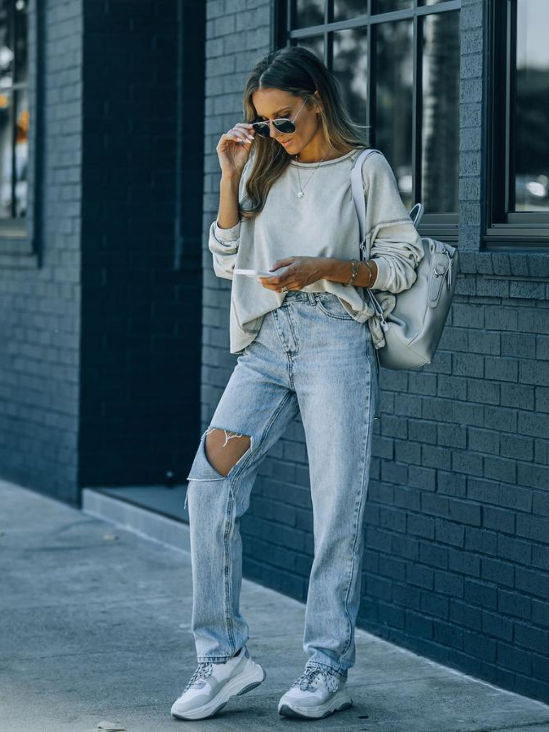 Distressed Asymmetric Waist Jeans Trendsi