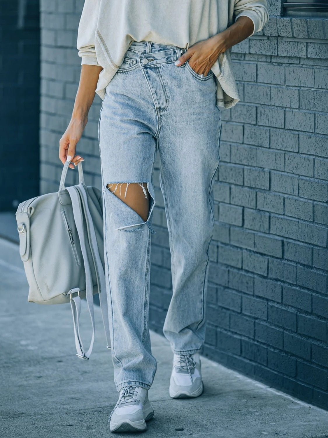 Distressed Asymmetric Waist Jeans Trendsi